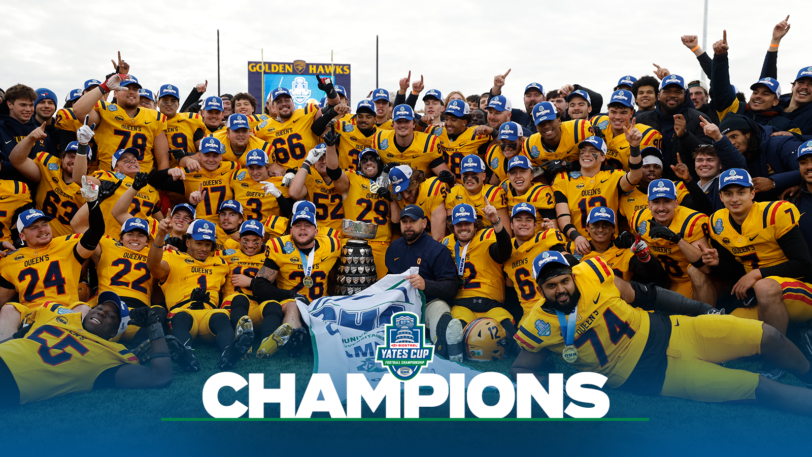 Banner photo of the Queen's Gaels after winning the OUA Championship with a blue gradient on the bottom and the Yates Cup logo and the Queen's Gaels logo on the bottom and the word Champion in large white letters.
