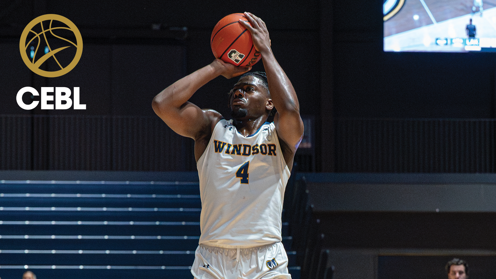 Action photo of Windsor Lancers Yohann Sam shooting the basketball with the CEBL logo in the corner 