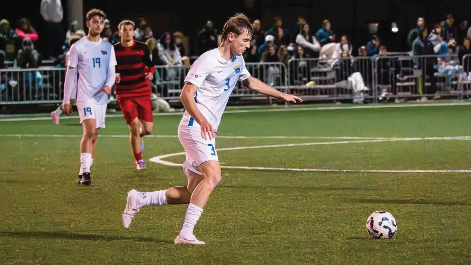 Action photo of a TMU Bold men's soccer player 